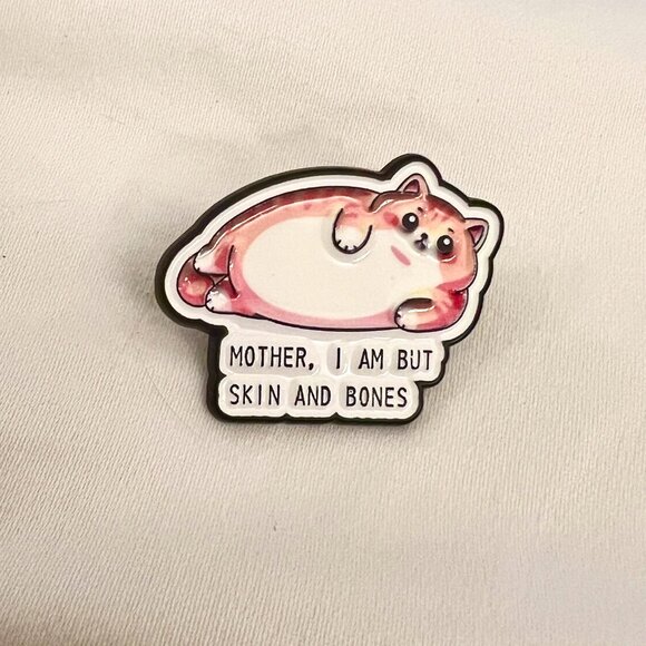 🧷Enamel Pin - Chonky Orange Cat With Caption "MOTHER, I AM BUT SKIN AND BONES." - Picture 2 of 4